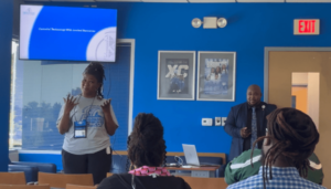 FSU Housekeeping Supervisor Nedra Stokes presents in front of an audience.