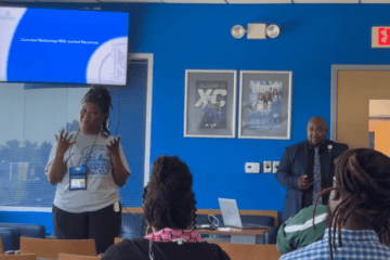 FSU Housekeeping Supervisor Nedra Stokes presents in front of an audience.